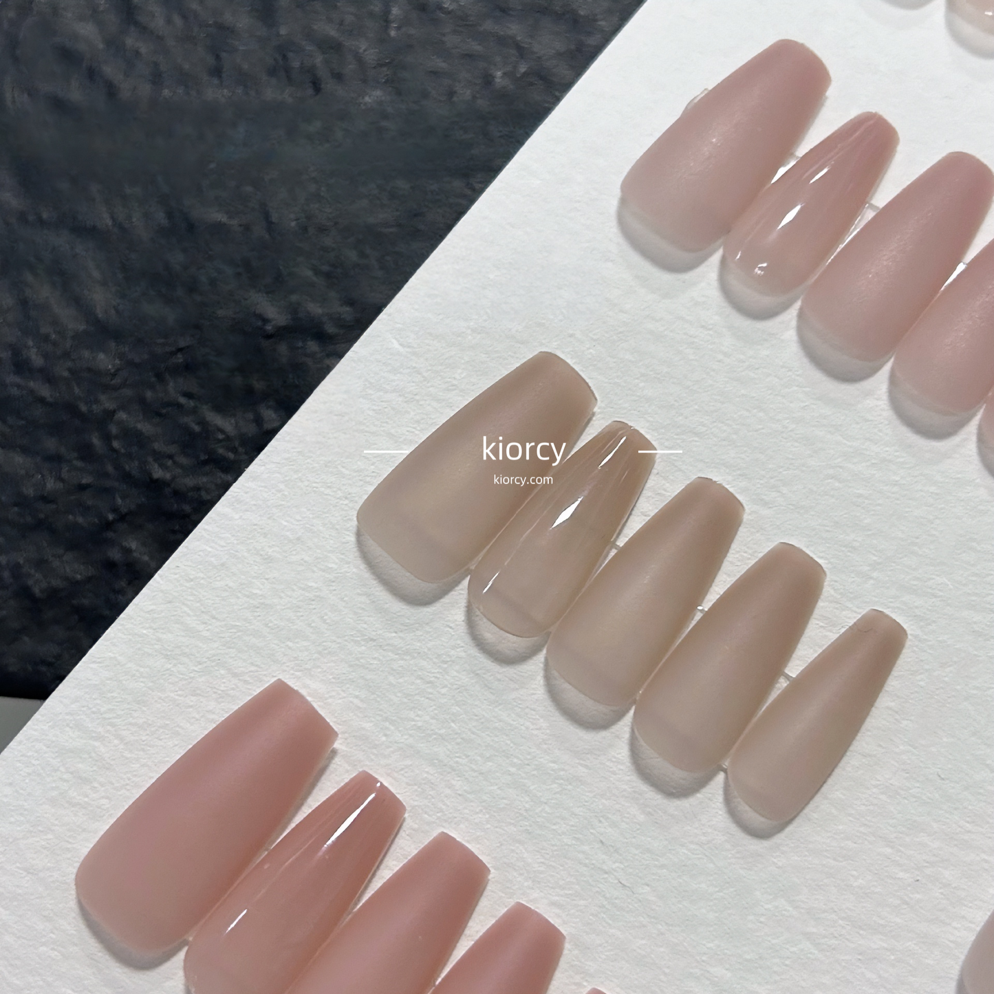 Colored nail tips in nude series